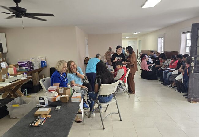 Nurses registering patients at the Medical Mission Brigade in Reynosa