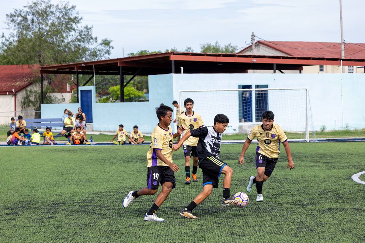 Youth soccer match on the turf field at the Rio Bravo Ministries campus in Reynosa